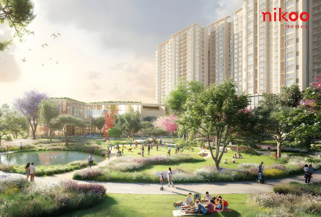 Landscaped park with pond and tree canopy at Nikoo Homes 8